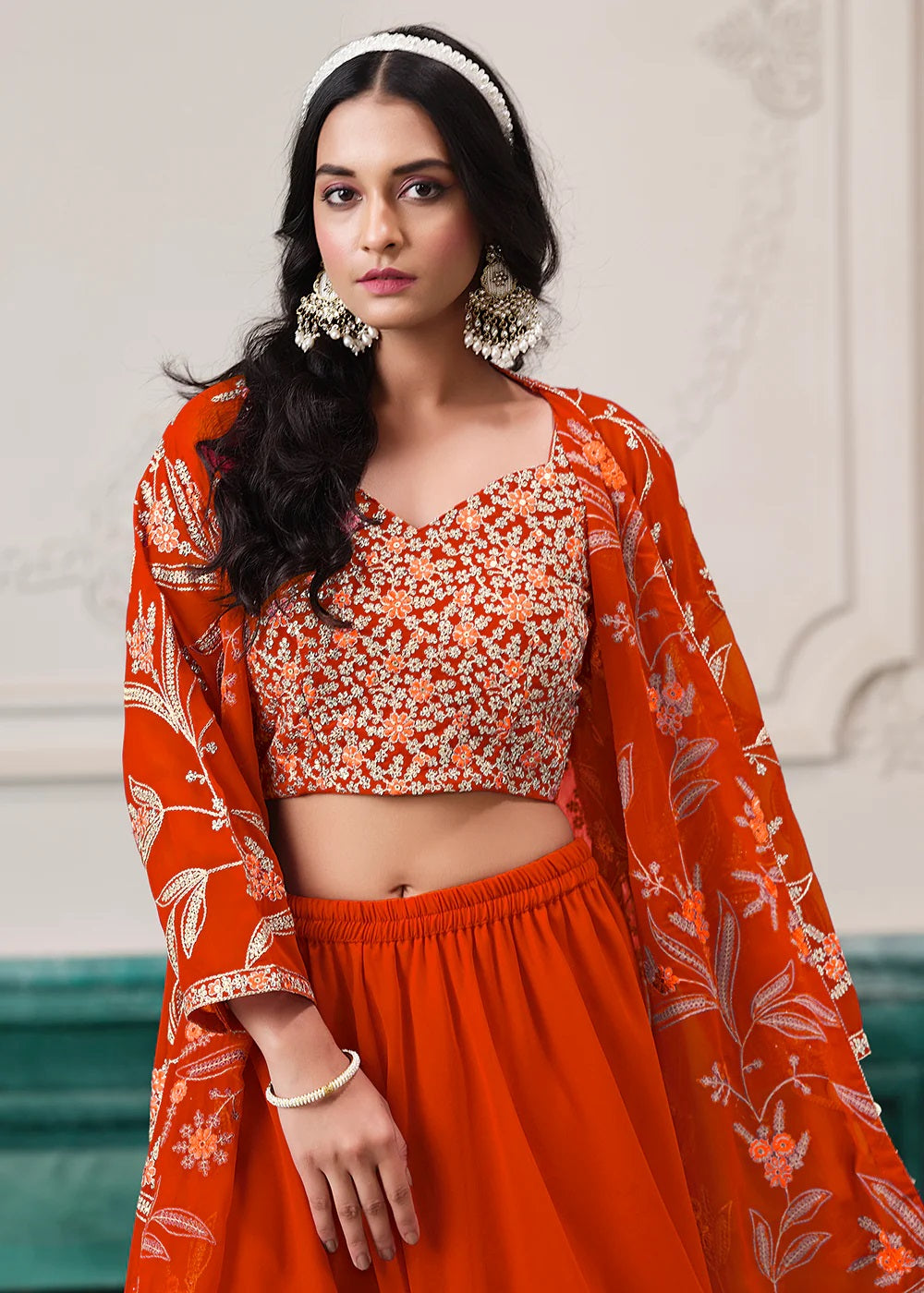 Indo-Western Orange Embroidered Jacket Style Sharara Suit